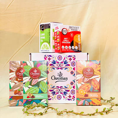 Chocolian Healthy Indian Trio | Chocolate Gift Hamper | Diwali Gift | Dark Choco Orange Bar ,Creame Coffee Chocolate Bar, Dark Rose Pistachio chocolate bar, Hot Chilli Cracker 200g & Lemon Herbal Tea 100g image