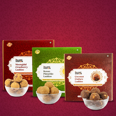 Guilt Free Happiness Box Combo - Besan Pistachio Laddoo (250 Gms) + Moongdal Cranberry Laddoo (250 Gms) + Coconut Cashew Laddoo (250 Gms) image