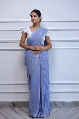 Handwoven Linen Saree Crafted In Mauve Colored Base With Silver Zari Border And Striped Aanchal image