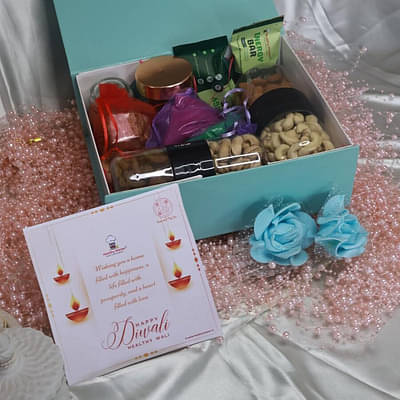 Healthy Master Diwali Surprises Special Gift Box | Perfect Festive Gift For Loved Ones |Assorted Mix Of Dryfruits ,Energy Bar,Chocolates ,Dry Fruit Choco,Pista,Kismis Premium,Almonds,Cashew ,Rangoli Powder And Jar Candle image